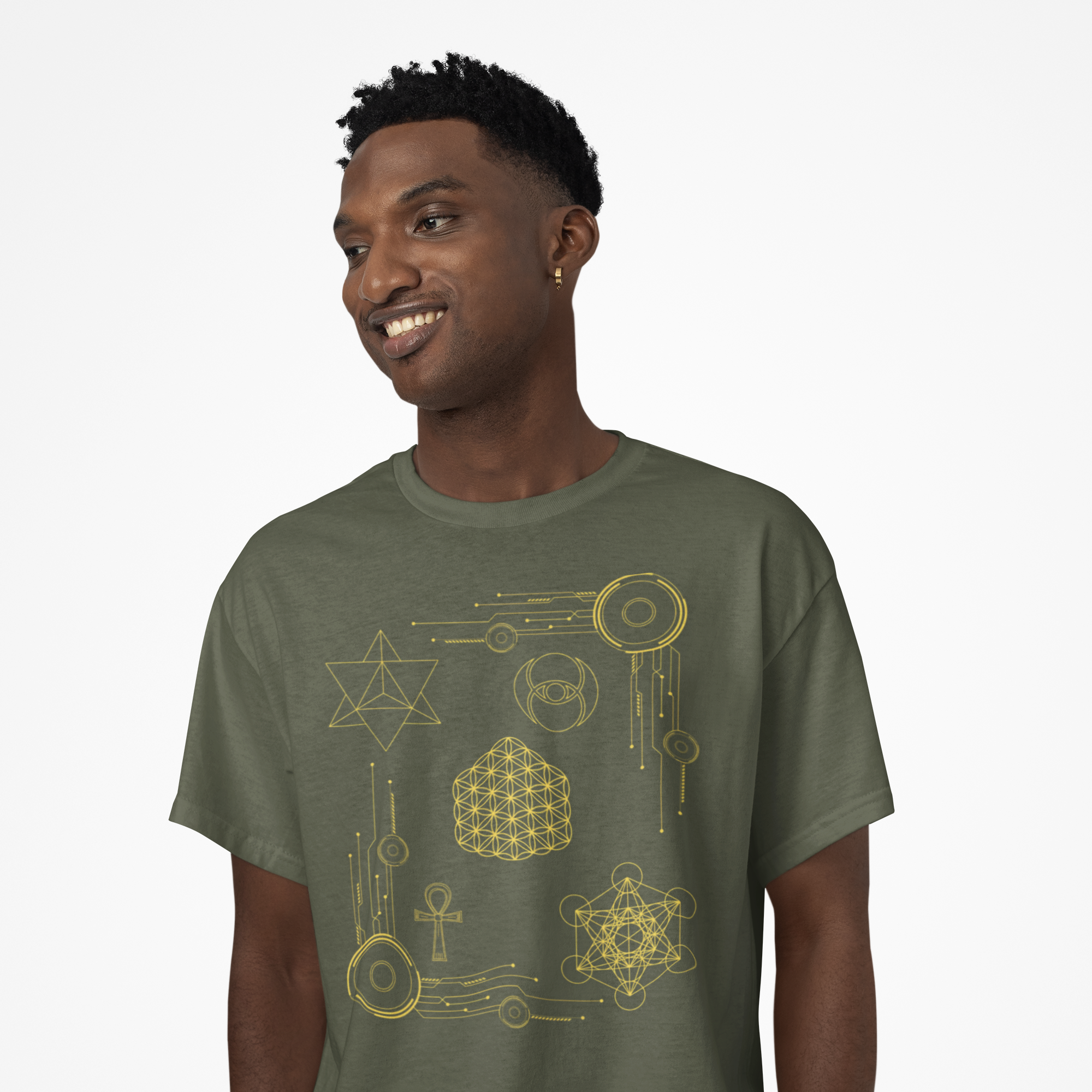 Man wearing a green t-shirt with geometric designs on a white background