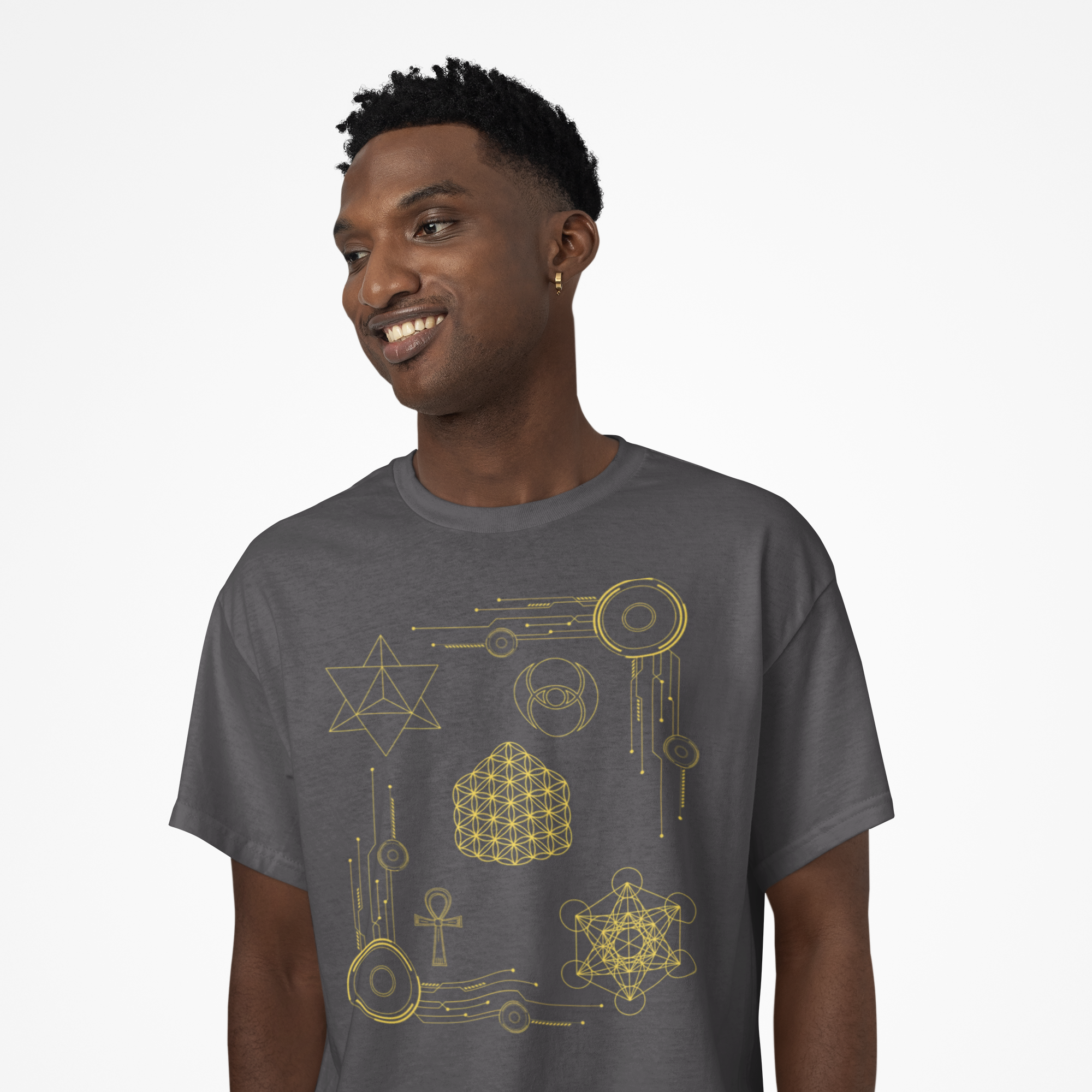 Man wearing a gray t-shirt with gold geometric designs on a white background